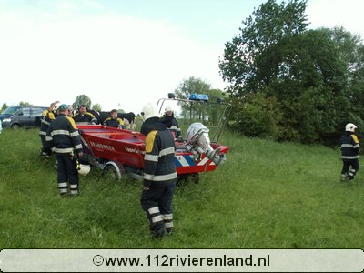 Schapen omringd door water