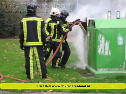 Kledingcontainer in de brand