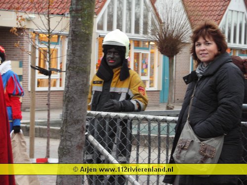 Brandweerpieten schieten piet te hulp