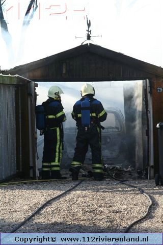 Schuur door brand verwoest