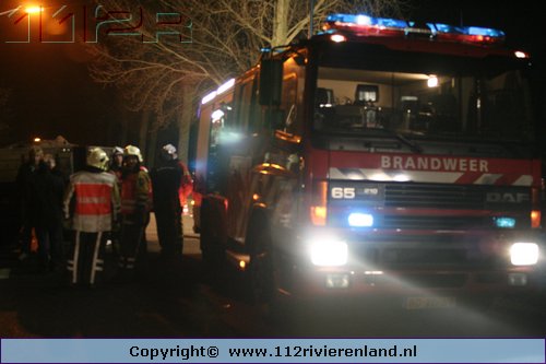 Auto onder vrachtwagen Tielseweg N835